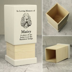 Elegant personalised dog urn for memorialising pets.
