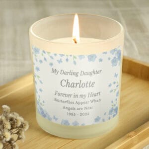 Memorial candle with personalised message for Charlotte, in memory of a beloved dog.