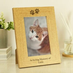 Memorial photo frame for pets with paw print design, personalised with pet's name. Perfect for remem.