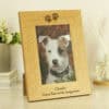 Oak finish 6x4 landscape dog memorial photo frame with paw print design and engraved personal message