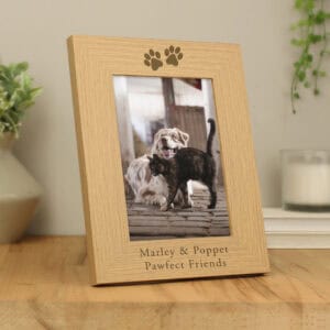 Personalised dog and cat paw print memorial photo frame with engraved names.