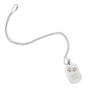 Personalised dog paw print memorial necklace with engraved message for pet remembrance.