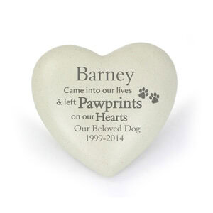 Heart-shaped dog memorial ornament with pawprints and personalised inscription.
