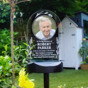 Personalised dog memorial solar light with photo and engraved message for loved pets.