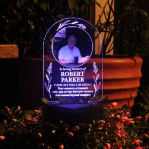 Memorial solar light featuring a personalised photo of a dog for pet remembrance.